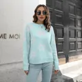 Detail van lichtblauwe oversized trui met witte jacquardpatronen van madeliefjes - S / Tops / Lichtblauw