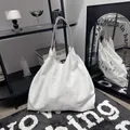 Large white textured tote bag with black and white rope handles minimalist chic. - M / Ribbed White