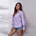 Vue détaillée d'une chemise lilas à manches bouffantes avec revers classique - Mauve Clair