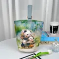 Artistic watercolor panda print canvas bucket bag featuring a light blue fabric handle - Off-White (Light Blue Handle)