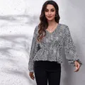 Stylish V-neck lantern sleeve peplum blouse featuring elegant heart print pattern - S / Tops / Black Hearts White Background