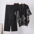 Women's 3-piece knit set featuring turtleneck sweater, wide-leg pants and patterned cape - Set / Black