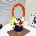 Creative cartoon canvas tote bag featuring an artistic lady print and segmented orange handle - Orange Floral Print / Single Piece / Yellow
