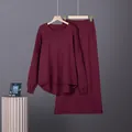 Detail view of burgundy two-piece knit sweater and long skirt set with a high-low hem design - One Size / Top And Bottom / Burgundy