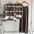 Detailed view of the 3-piece striped knit set with cardigan and wide-leg pants. - One Size / Set / Brown