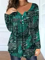 Close-up of green paisley print top with buttoned V-neckline and relaxed long sleeve fit - XL / Tops / Dark Green