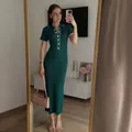 Elegant dark green ribbed polo maxi dress with white contrast piping and button details. - S / Dresses / Green