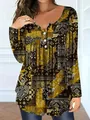Detailed view of bohemian paisley print on women's V-neck button long sleeve top - XL / Tops / Yellow