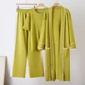 Detail view of a three-piece lime green knit set featuring contrast white stripes and texture - One Size / Set / Mustard Yellow