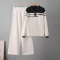 Detail of a two-piece striped knit set featuring a polo sweater and wide-leg pants. - One Size / Top And Bottom (6635) / Apricot