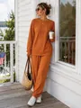 Ensemble deux pièces orange en maille torsadée avec haut manches longues et jogging chic. - Orange
