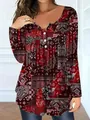 Detailed view of women's burgundy paisley print long-sleeve top with V-neck button - XL / Tops / Red