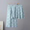 Light blue jacquard knitted two-piece set with crew neck sweater and wide-leg pants - One Size / Top And Bottom / Blue