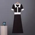 Detail of French retro color-block knit polo dress with contrast white collar - S / Dresses / Brown