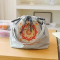 Grey drawstring lunch bag featuring vibrant mandala embroidery and side buckles - One Size / Light Gray Mandala Floral