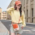 Outdoor lightweight crossbody sports bag in orange and beige for hiking and travel - Color Block Drawstring Style / Orange-Beige