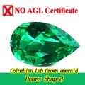 Macro detail of a pear-shaped Colombian lab-grown emerald gemstone with vibrant green color - Without AGL Certificate / 3x5mm
