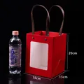 Premium red festive gift bag with transparent window and sturdy handles 15x15x20cm - 20x15x15cm / 10 Pieces/Pack / Red