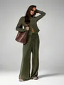 Model wearing a dark olive green long sleeve cardigan and high waist wide leg pants set - S / Top And Bottom / Army Green