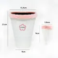 White plush flower packaging cone with pink furry trim and detailed size markings - Cheese White