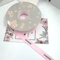 Elegant pink frayed-edge grosgrain ribbon with CHANGE text print for floral gift wrapping. - 1.5cm x 20 Yards / Water Pink