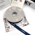 Navy blue frayed edge grosgrain ribbon with white CHANGE print for gift wrapping - 1.5cm x 20 Yards / Navy Blue