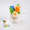 Electric flower bouquet bubble machine toy with blue and orange flowers, 23.7cm height - 14.2x23.7cm / Beige