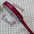 Elegant burgundy grosgrain ribbon with white 'serendipity' text for luxury gift wrapping - Serendipity / 1.5cm x 50 Yards / Raspberry Red