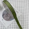 Army green grosgrain ribbon with black Serendipity print for flower gift wrapping - Serendipity / 1.5cm x 50 Yards / Avocado Green