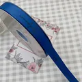 Elegant royal blue grosgrain ribbon with black serendipity cursive print for gift wrapping - Serendipity / 1.5cm x 50 Yards / Blue
