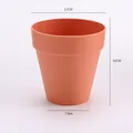Mini terracotta colored planter with 11cm diameter, perfect for DIY and home decor - Medium (11x10cm)