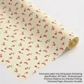 Premium schneebirne Papier mit rotem Rosenmuster, 50x70cm Einlegepapier in Creme - Gelb mit roter Blume / 20 Stück/Packung