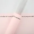 Elegant single stem pink rose packaging sleeve with transparent top and printed text - Goddess Single Bag / Pack of 20 / Water Pink