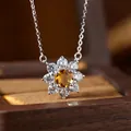 Detailed close-up of a floral S925 sterling silver necklace with a yellow citrine pendant - Citrine (N537)