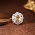 Macro view of S925 sterling silver ring featuring a yellow citrine in a lace setting - Adjustable Open / Natural Citrine