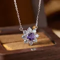 Elegant close-up view of a purple amethyst flower pendant on an S925 sterling silver chain - Amethyst (N537)