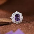 Close-up of elegant S925 silver ring featuring an oval purple amethyst and lace-like crystal halo. - Adjustable Open / Natural Amethyst