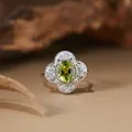 Close-up detail of natural green peridot s925 sterling silver ring in vintage style - Adjustable / Natural Peridot Ring