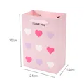 Large pink gift bag with heart patterns and clear size dimensions 35x24x14cm for gifts - 3 Pieces/Pack (24x14x35cm) / Pink
