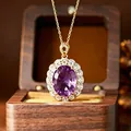 Close-up of a large oval amethyst pendant with millennium cut in a luxury wooden jewelry box. - Natural Amethyst Necklace (N577) / Chain Length 40+5cm / Purple
