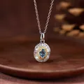 Elegant macro view of a silver necklace featuring a vivid blue gemstone on wood - Natural Topaz Necklace (Two-Tone Color)