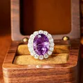 Detailed view of a vintage oval purple amethyst ring in a premium wooden jewelry box - Natural Amethyst Ring / Adjustable Open