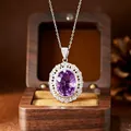 Exquisite close-up of a large oval amethyst pendant necklace on a silver chain - Pendant Necklace / Natural Amethyst + Silver