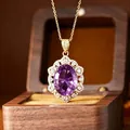 Detailed macro view of an elegant gold-plated amethyst pendant with sparkling white stones - Necklace / Natural Amethyst Necklace
