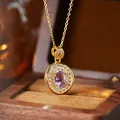 Close-up of gold-plated silver necklace with oval amethyst and pavé CZ pendant - Natural Amethyst Gold