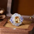 Detailed close-up view of vintage palace style citrine ring with amethyst accents - Natural Tanzanite and Citrine