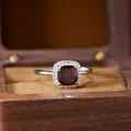 Close-up detail of a cushion-cut red gemstone ring in S925 sterling silver setting - Natural Garnet Ring (R603)