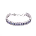 Detailed macro shot of S925 silver bracelet with double rows of elegant blue oval gemstones - Blue (Natural Sapphire)