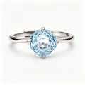 Detail shot of a S925 silver ring featuring an octagonal light blue topaz stone - Natural Topaz Ring