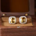 High-detail macro view of square cut yellow citrine stud earrings in S925 sterling silver - Natural Citrine Stud Earrings